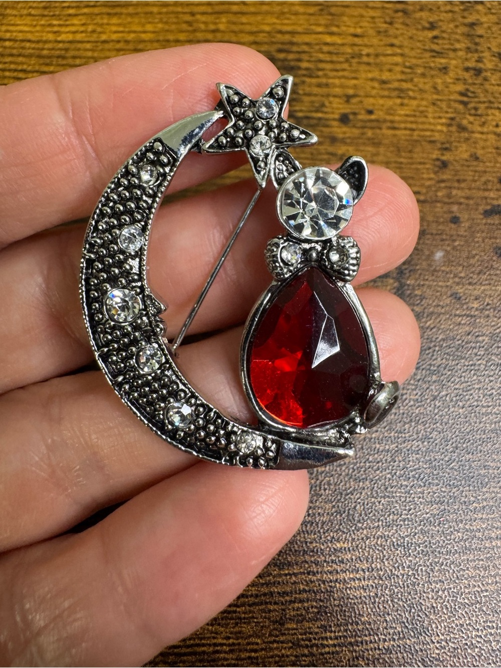 Silver-Tone Cat on Moon Brooch with Red Crystal Accent